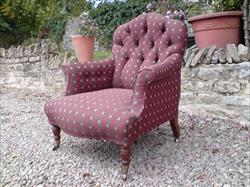 Howard and Sons button back antique armchair.jpg